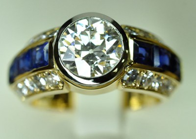 Platinum sapphire and yellow gold ring