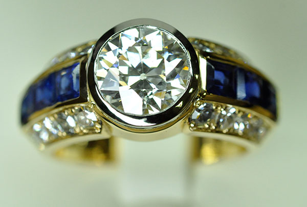 Platinum sapphire and yellow gold ring
