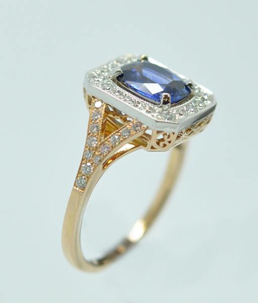 Rose gold & white gold sapphire diamond ring with carved Maori pattern basket