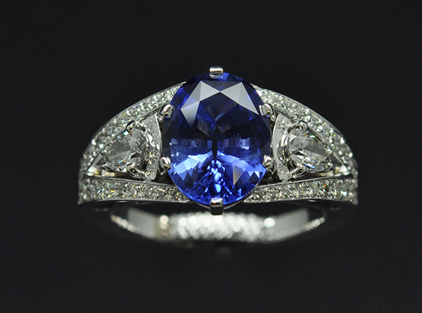 Sapphire diamond ring. Pear diamonds with secret engraving above