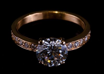 Solitary ring accompanied. Rose gold setting diamonds