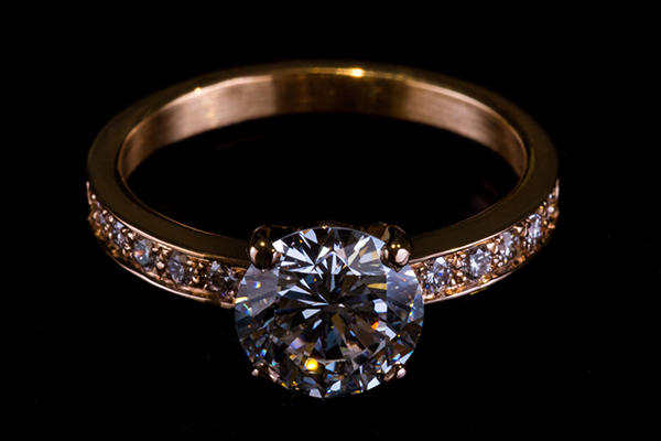 Solitary ring accompanied. Rose gold setting diamonds