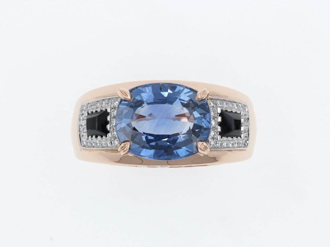 Bague bicolore en or rose et platine, saphir, onyx et diamants