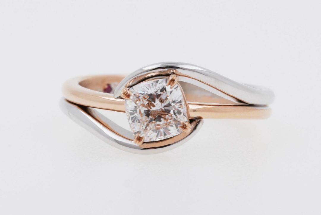Solitaire diamant bicolore en or rose et or blanc palladié