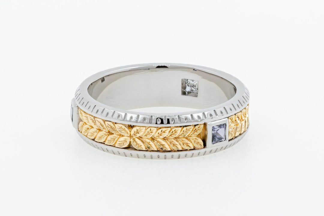 two -color ring (white gold and yellow gold) and spinel